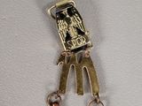 an image of a necklace with an eagle on it