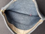a close up of a hat with a zipper on it