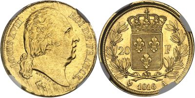 a gold sovereign coin with a crown on top of it