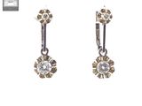 pair of diamond earrings on a white background