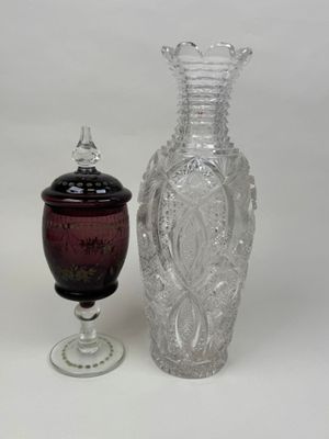 two vases that are next to each other on a table