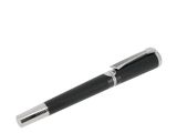 un stylo posé sur une table