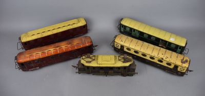 four different types of toy trains are shown on a white surface