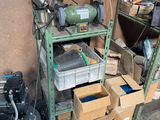 a green cart with a lot of boxes on it
