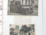 an old photo of a couple of people in an old car