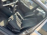 a picture of the inside of a car with the door open