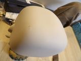 a lamp that is sitting on a table next to a bag