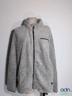 the jacket is gray and black on a mannequin mannequin mannequin mannequin mannequin mannequin mannequin mannequin