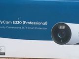 a box with a camera inside of it on the floor