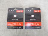 two black and red gaming cards sitting on top of each other
