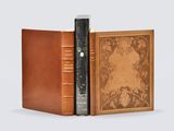 an image of a book with a leather cover and a book in it