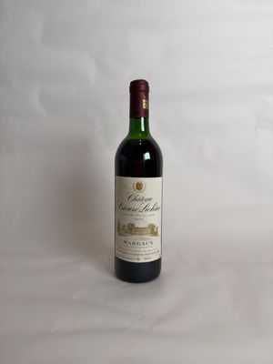 a bottle of wine that is sitting on a table