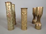 three vases sitting next to each other on a table