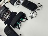 a lot of glasses that are sitting on a table
