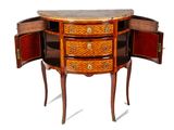 a small wooden cabinet with a marble top and drawers