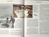 an open book with a picture of a man and a dog on a boat
