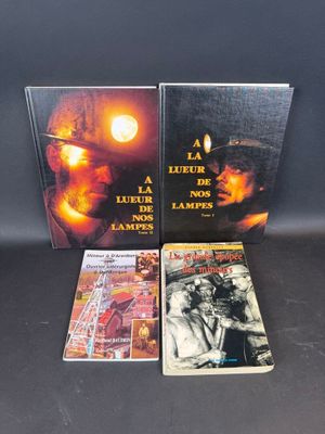 two books are sitting on a table next to each other