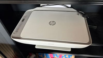 a printer that is sitting on top of a desk