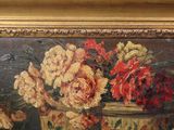 a painting of flowers in a vase on a table