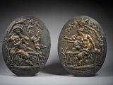pair of bronze plaques depicting a man and a woman in a garden