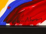 painting of a red, yellow, blue, and white abstract painting on a black surface