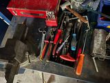 many tools that are sitting on a workbench