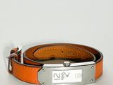 an orange leather bracelet with a silver buckle on a white background