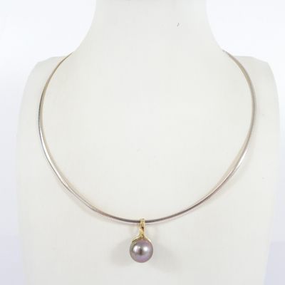 a close up of a necklace on a mannequin mannequin mannequin mannequin mannequin mannequin mannequin mannequin