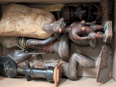 a box full of african artifacts in a box