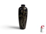 a black vase that is sitting on a white surface