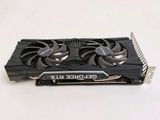 a close up of a video card on a white surface