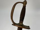 a close up of a sword on a white background