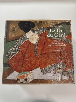 the cover of the book le dit du genni is displayed on a table