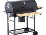 a black bbq grill with a wooden shelf and wheels