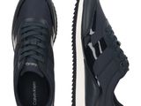 a close up of a pair of black sneakers on a white background