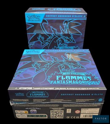 a box of pokemon trading cards with a picture of a dragon on it