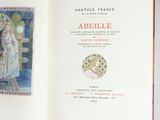 an open book with a picture of a woman on it
