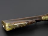 a close up of a knife on a black surface