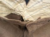an old pair of pants that have been worn by a man
