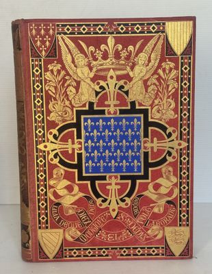 un livre rouge orné de motifs dorés et bleus