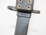 a close up of a metal object with holes in it