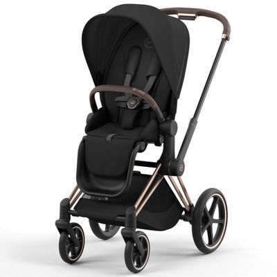 la poussette de type « buggy » en noir et or