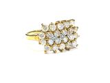 a close up of a diamond ring on a white background