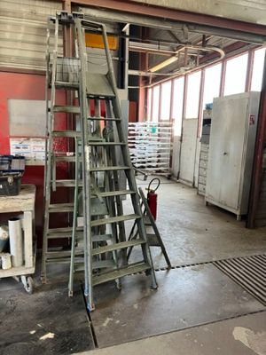 an image of a room with a ladder and other items