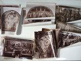 a lot of old photos in a box on the table