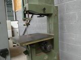 a machine that is sitting on a pallet in a building