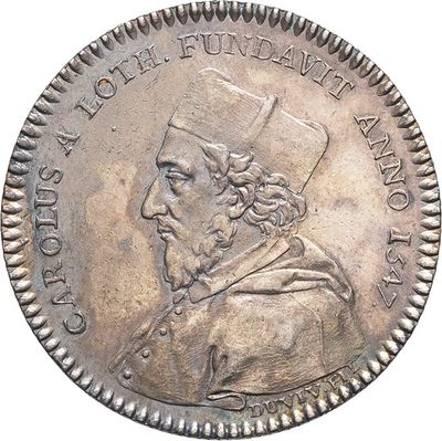 a close up of a coin with a man in a hat on it