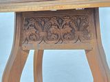 a wooden table with a clock on top of it