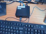 a keyboard and a mouse on a desk next to a monitor