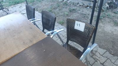 a table and chairs that are outside on the patio